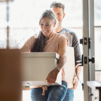 Young couple moving into new home